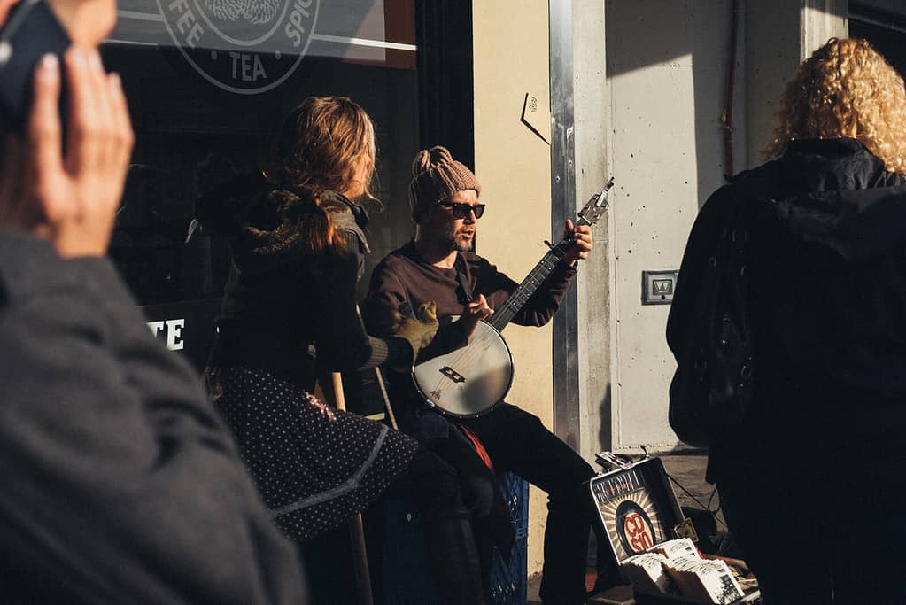 Street Performer playing a guitar in Seattle